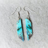Chrysocolla gemstones hanging on sterling silver ear wires.  