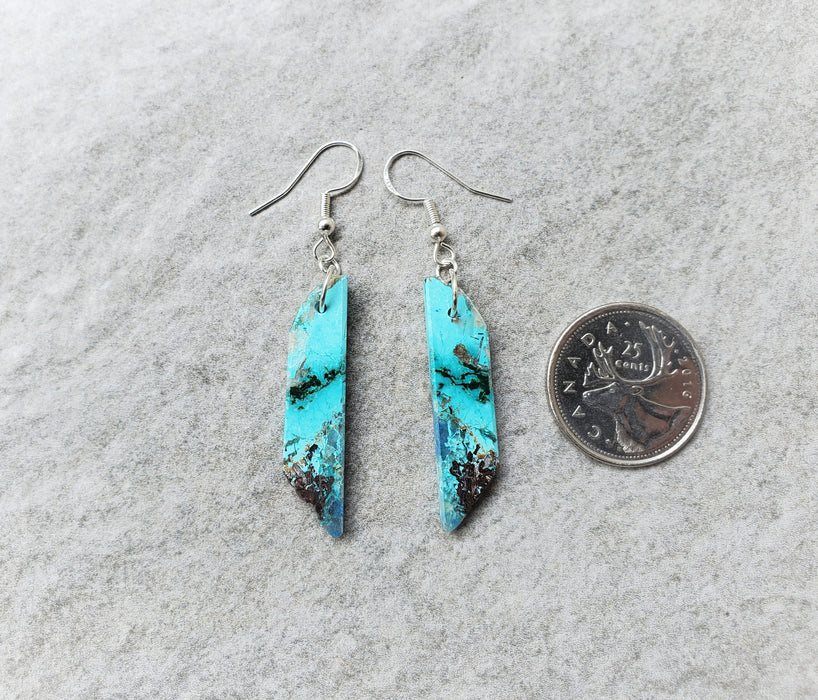 Chrysocolla gemstones hanging on sterling silver ear wires.  
