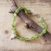 Hand knotted Peridot nugget bracelet with sterling silver leaf charm