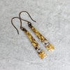 Picasso Jasper gemstones on antique brass coloured ear wires. Rustic Boho style ear jewelry. 