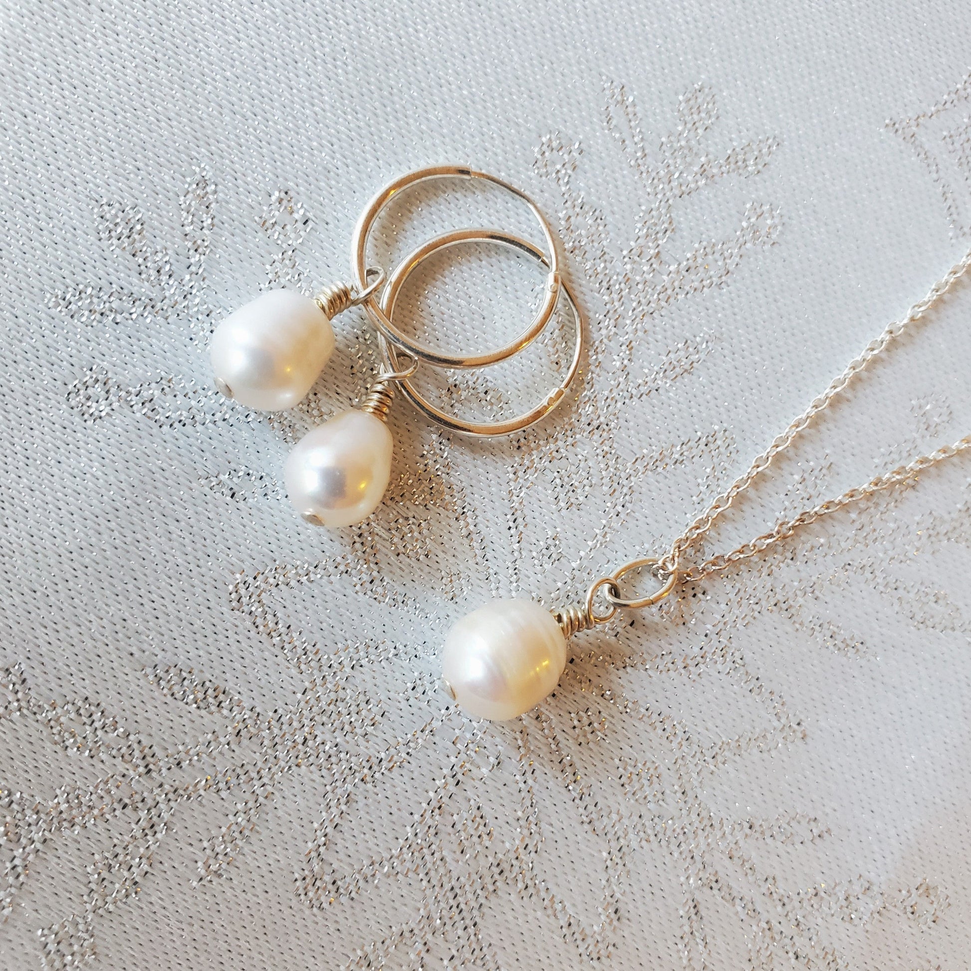 Potato pearl pendant with sterling silver chain and matching earrings