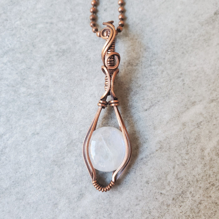 Rainbow Moonstone wire wrapped pendant, Wrapped in copper wire. 