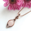 Round rose quartz crystal wire wrapped in copper wire. Rustic Boho pendant on copper ball chain. 