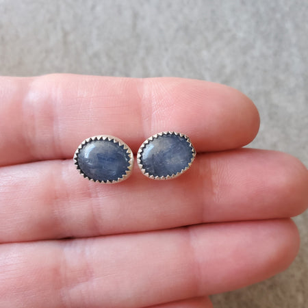 Bezel set oval blue kyanite stud earrings