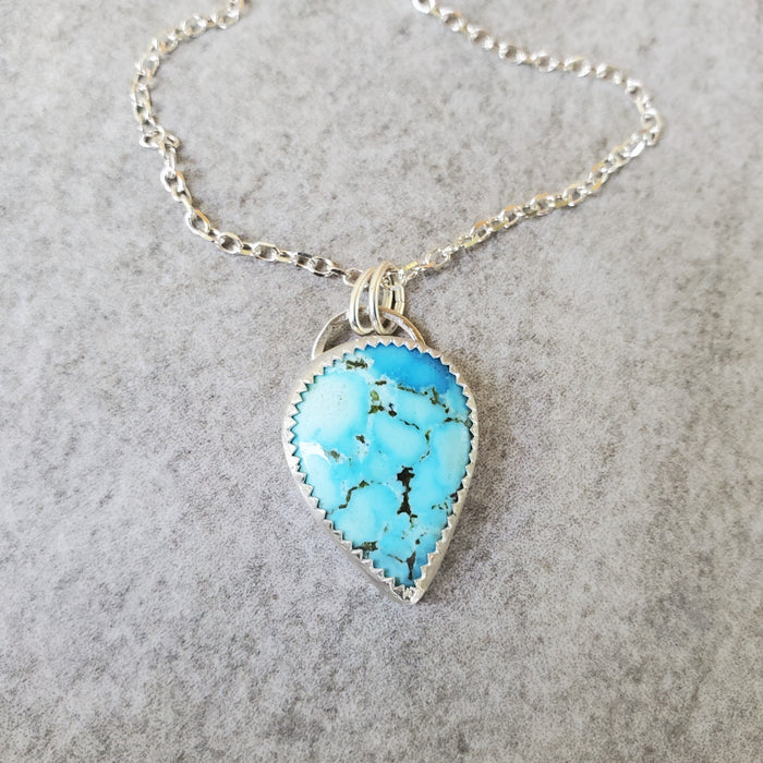 Tibetan Turquoise bezel set in sterling silver 