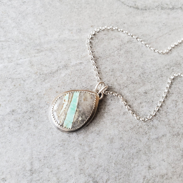 American Variscite stone bezel set in sterling silver hanging from silver chain