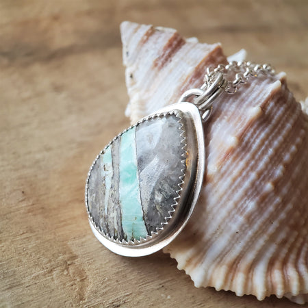 American Variscite stone bezel set in sterling silver hanging from silver chain