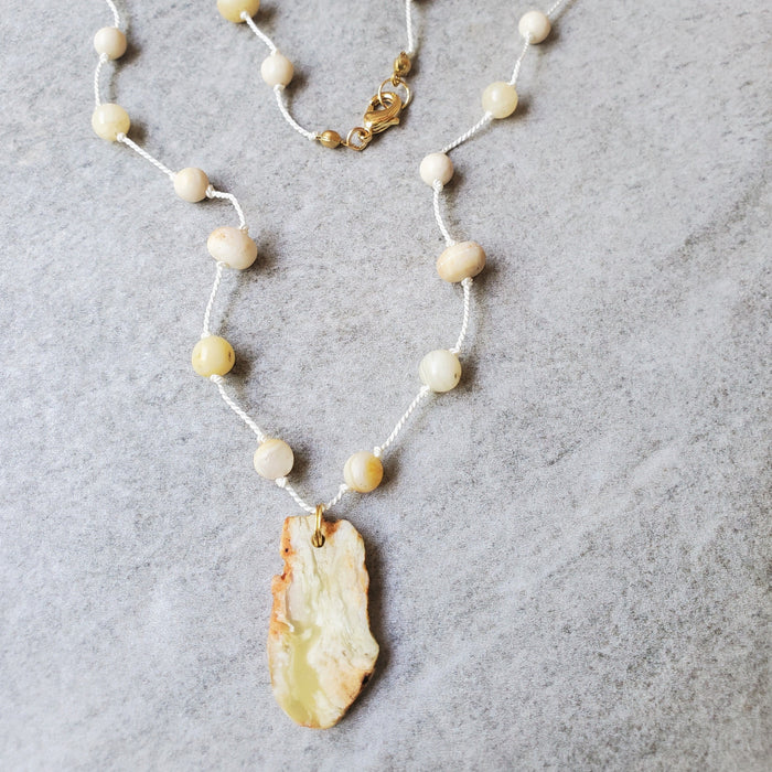 Hand knotted silk necklace featuring yellow opal nugget